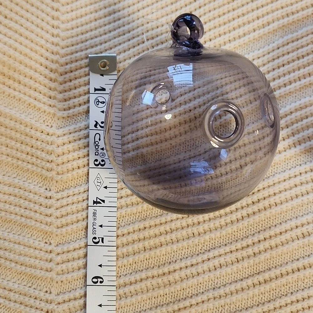 Pair of hand-made purple/pink glass Xmas ornaments with holes